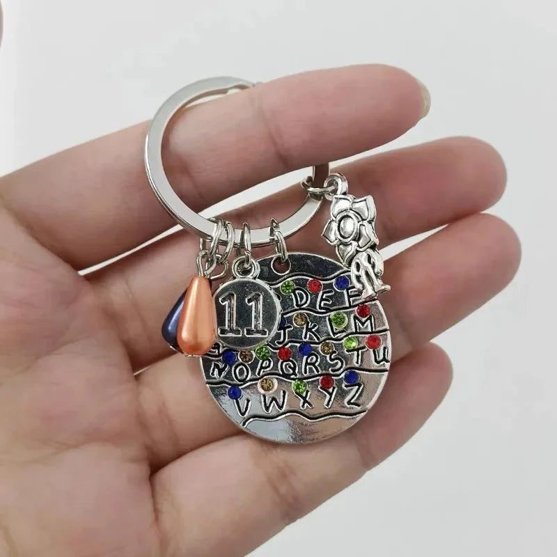 Llavero Stranger Things Once – Diseño Cristales de Colores